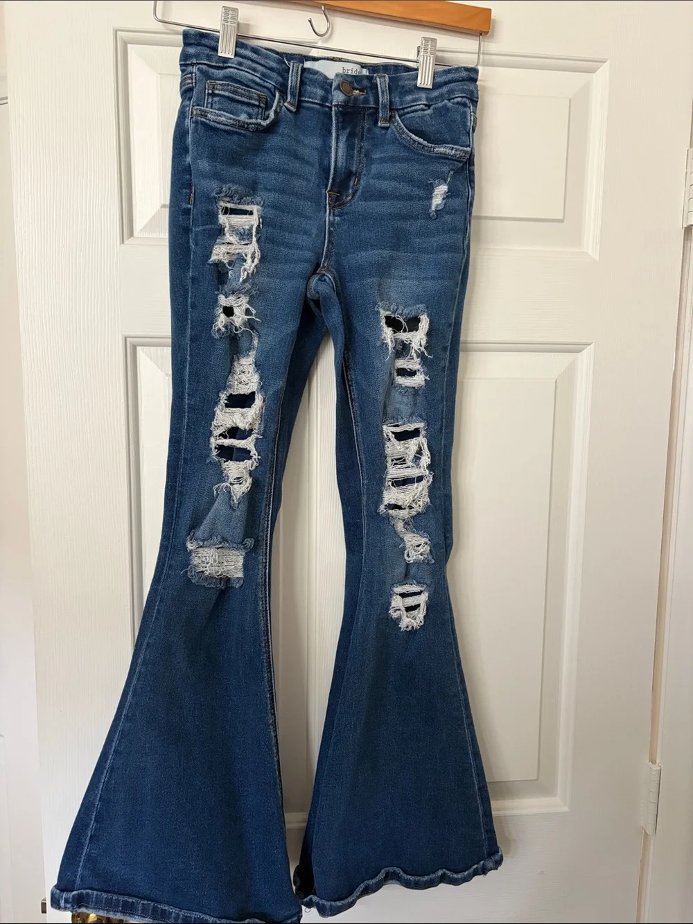 Distressed Dark Blue Flare Jeans with Ripped Detail
